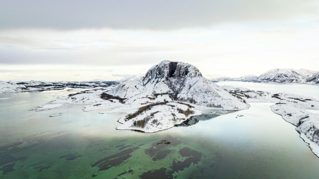 The fairy tale mountain Torghatten seen from the air on a winter's day